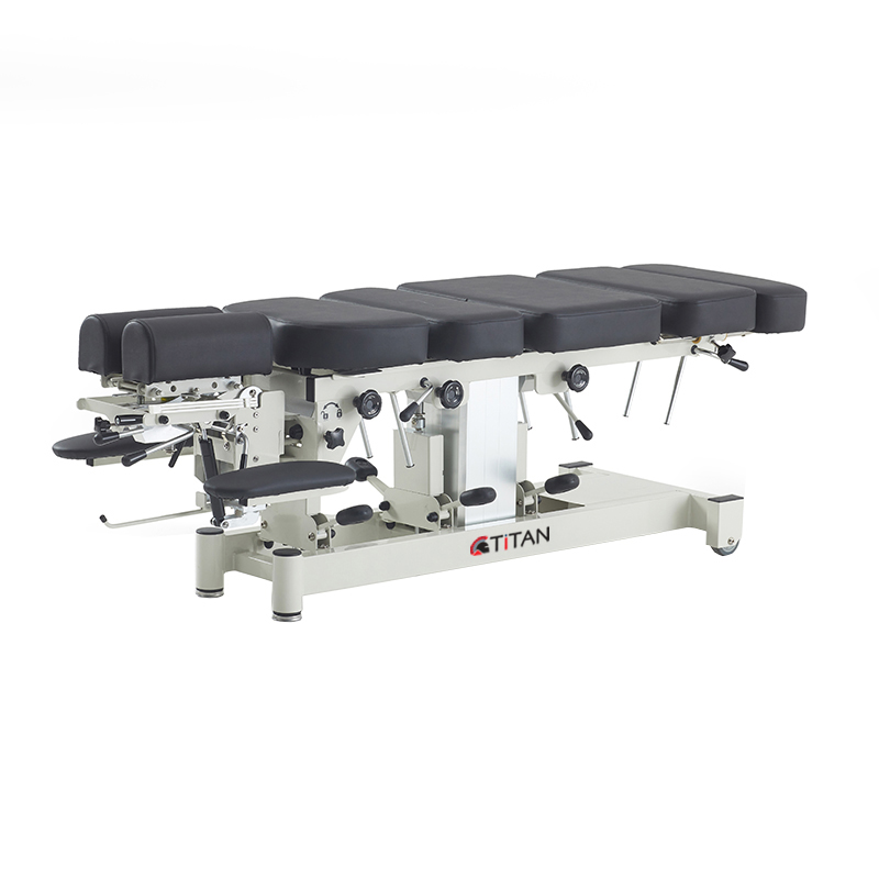 17164562686300 An examination table with a black seat and footrest