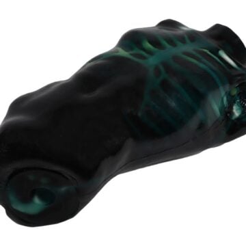 A black and green plastic of a body formed